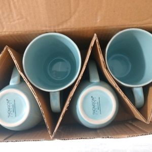 Set of four beachy coffee mugs